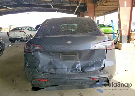 2023 Tesla Model Y из США, поврежденный, VIN 7SAYGDEE7PF748544